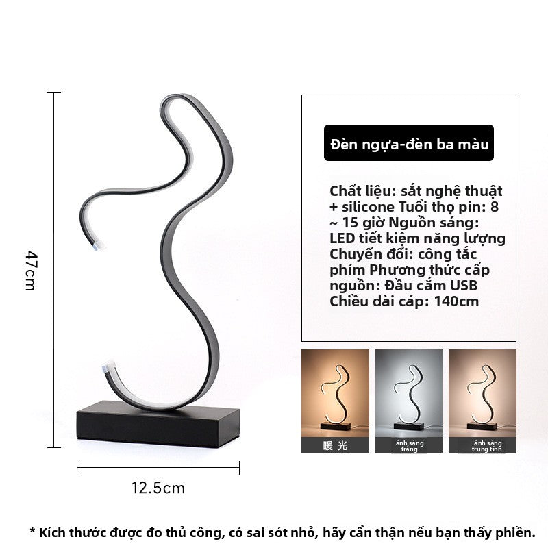 Đèn bàn Bắc Âu đèn đầu giường phòng ngủ đèn LED sáng tạo cá tính thanh không khí đèn ins gió giá trị