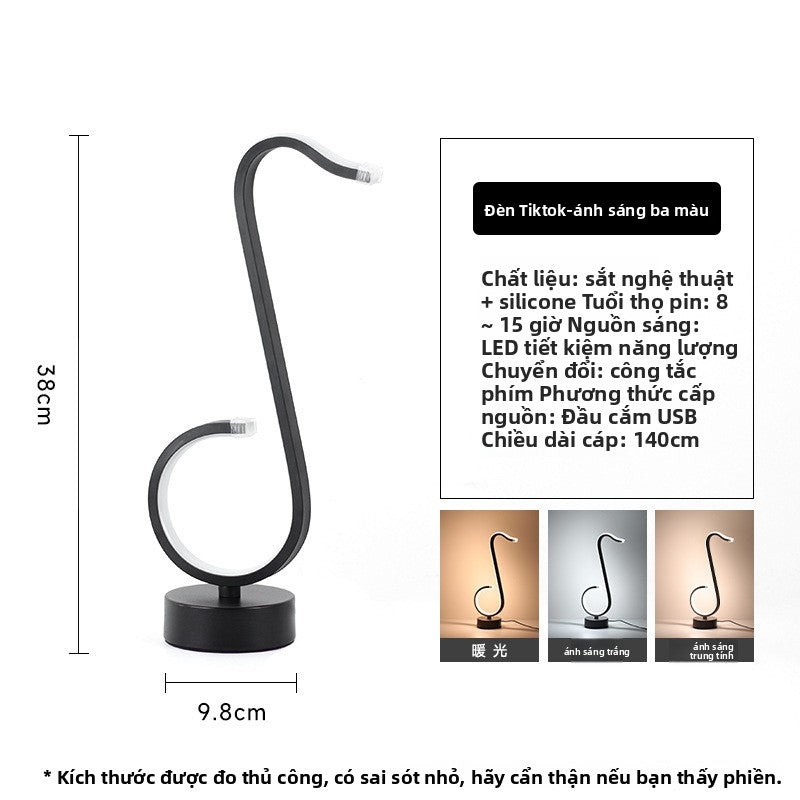 Đèn bàn Bắc Âu đèn đầu giường phòng ngủ đèn LED sáng tạo cá tính thanh không khí đèn ins gió giá trị